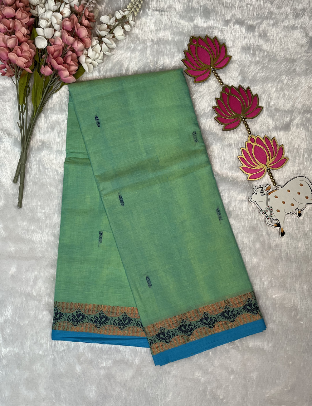 Light Green Kanchi Cotton Saree with Butta All Over - Small Thread Border